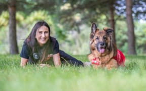 Kotuku foundation founder Merenia Donne with her medical assistance dog Arica, who has been with her for 11 years.