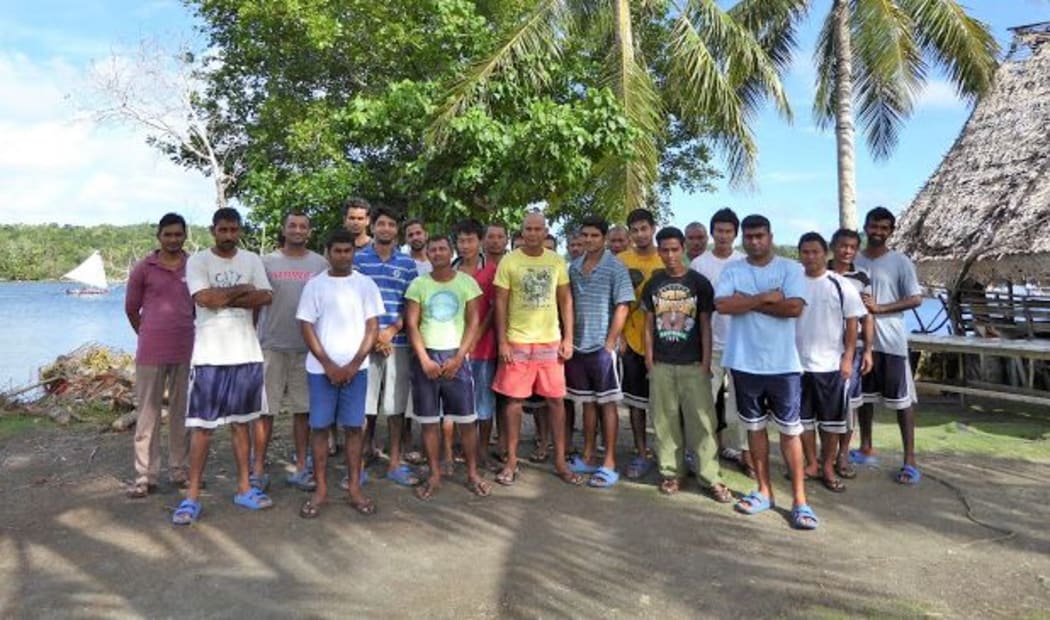 Some of the 34 Nepalese and asylum seekers who lived on Yap for 18 months. All but four have been repatriated.