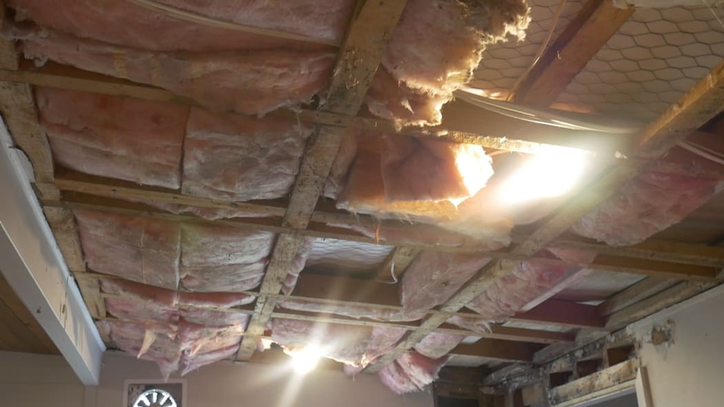 Jennifer Rush's broken ceiling at the back of her bookshop.