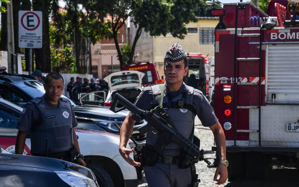 Police work at the scene of a shooting at a school in Suzano, Sao Paulo metropolitan region, Brazil.
