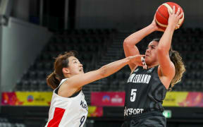 Tall Fern Charlisse Leger-walker shapes to shoot against Korea.