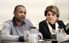 Gary Dennis represented by attorney (C) Glorida Allred hold a press conference to discuss alleged new R Kelly tape in New York City.