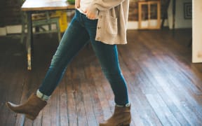 Woman wearing jeans (stock photo)