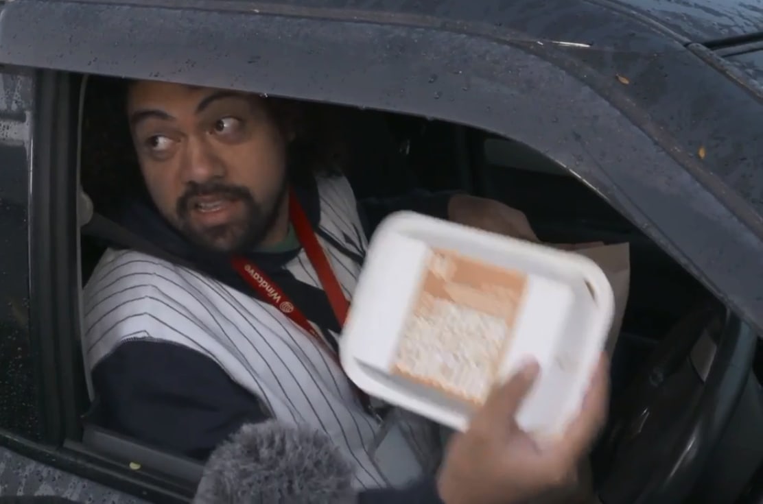 One of many fast food fans interviewed by media through the car window at the drive-thru on Tuesday.