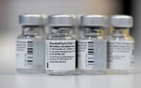 Empty vials of the Pfizer-BioNTech Covid-19 disease vaccine are displayed at the regional corona vaccination centre in Ludwigsburg, southern Germany, on January 22, 2021.
