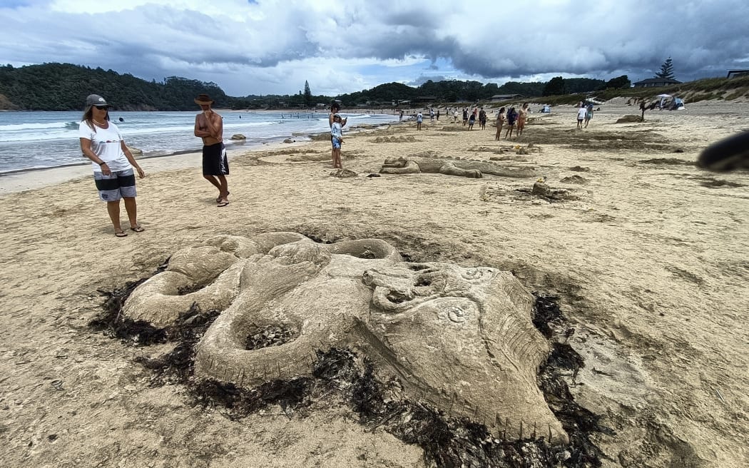Various sand sculptures from the New Year's Day sand sculpture competition at Matapouri beach.