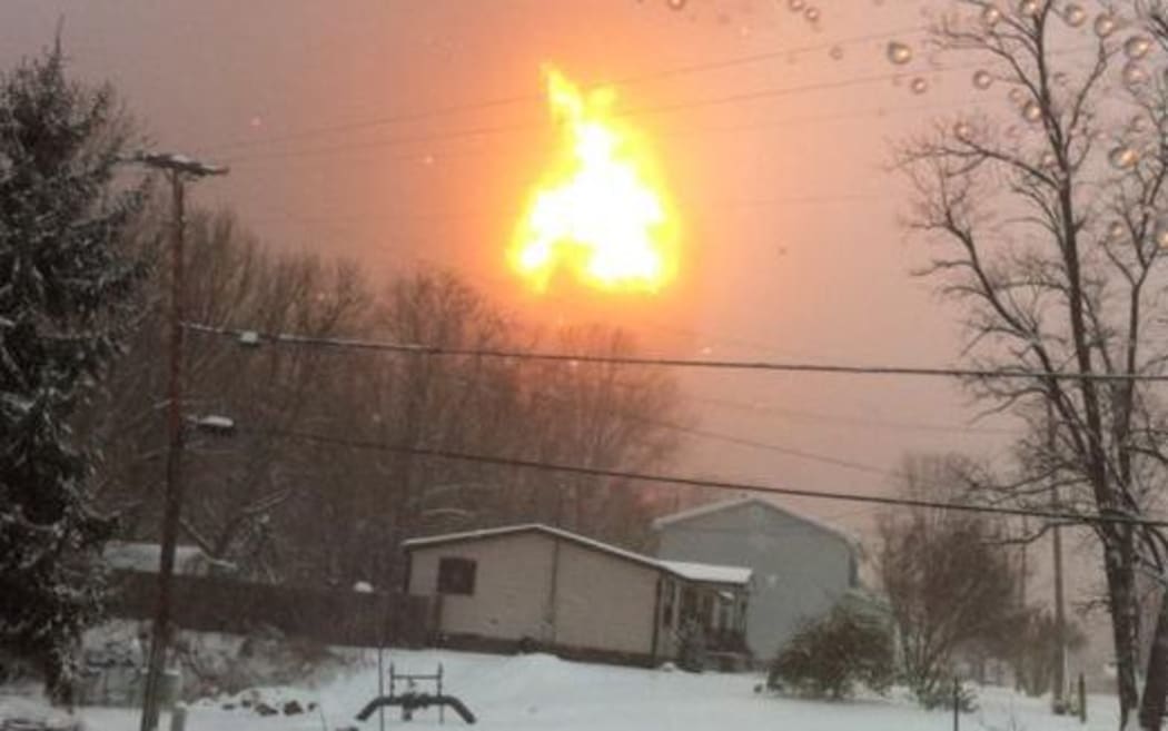 A freight train carrying crude oil has derailed and burst into flames in West Virginia.