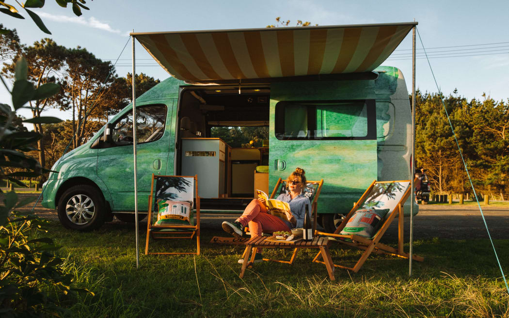 Curator Aimee Ralfini outside Vallery, art gallery campervan