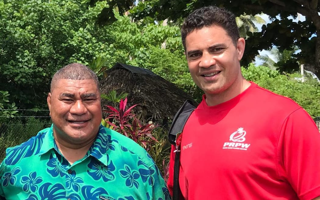 A photo of Samoan Rugby legend, Va'aiga Lealuga Tuigamala Pulelua Fesola'i aka Inga the Winger with Dan Leo of Pacific Rugby Players Welfare