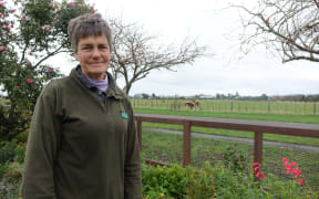 Angela Connell whose Fookes Street property will be affected by transmission lines.