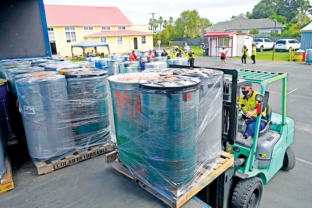 The drums are loaded on to a truck in Gisborne prior to being transported to Auckland for shipment.