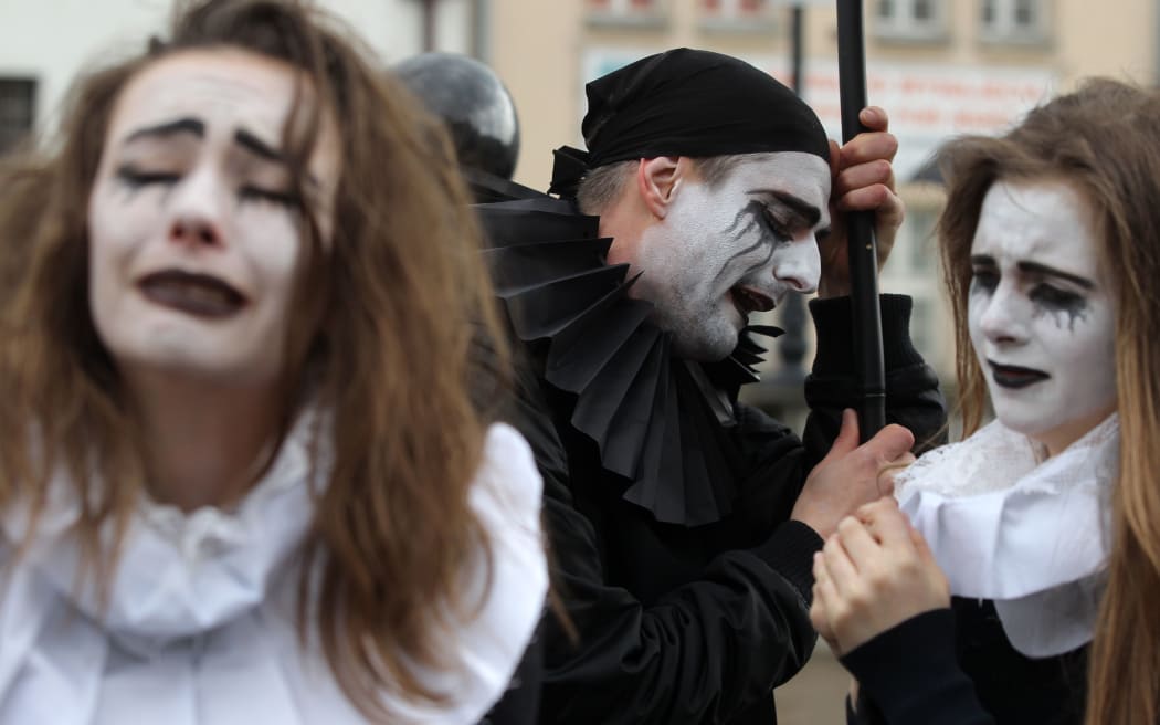 Costumed mourners march in Gdansk, Poland, to mark the 400th anniversary of the death of English playwright William Shakespeare.