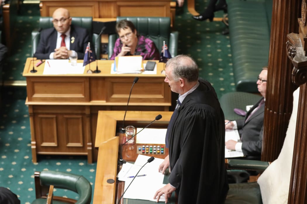 Speaker Trevor Mallard on his feet in the chamber, while Ron Mark and Tracy Martin listen to his ruling.