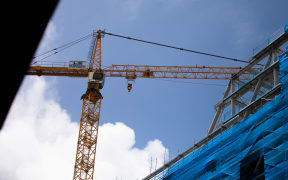 Crane's work on a building site