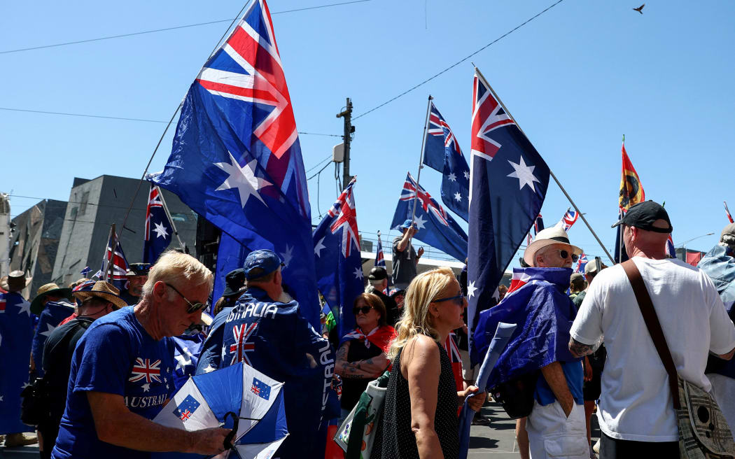 Demonstrators gather to take part in the annual "Invasion Day" protest march through the streets of Melbourne on Australia Day on January 26, 2026. (Photo by Izhar KHAN / AFP)