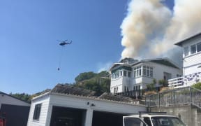 Helicopters with monsoon buckets were diverted from the Pigeon Valley fire in 2019 to Walters Bluff after an arson threatened a number of homes.
