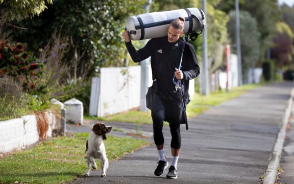 David Nyika and furry friend training during the Covid-19 lockdown.