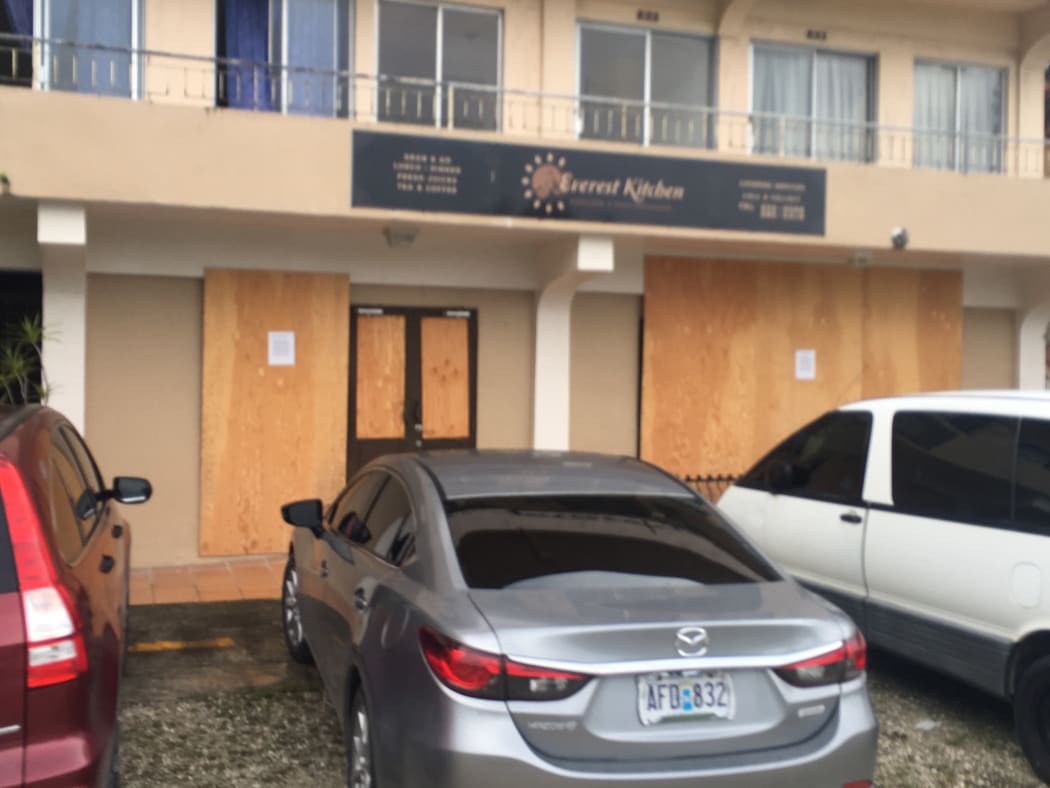 A boarded up business in Saipan.