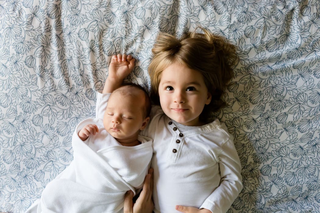 little girl and baby