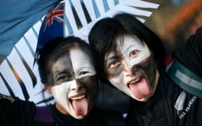 All Black fans celebrate before kick-off at the RWC 2015 final.
