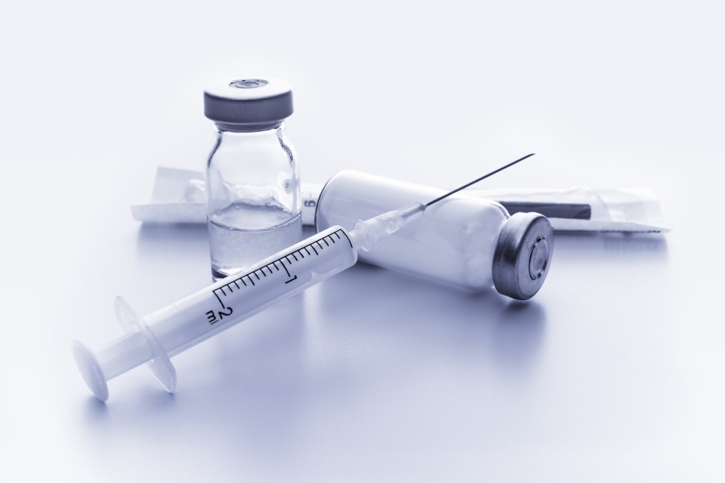 Medical ampoules and syringe.