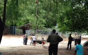 A Tamil asylum seeker on Nauru spent nine hours up a tree threatening to commit suicide on Sunday.