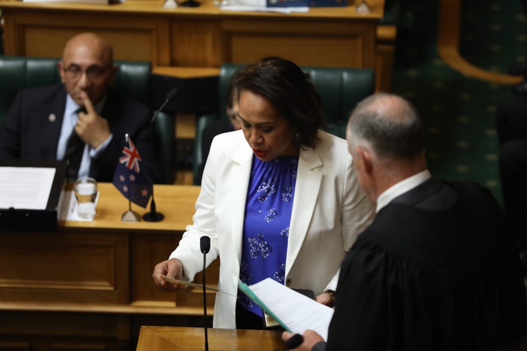 National MP Agnes Loheni is sworn in to Parliament.