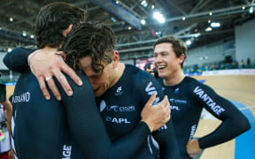 Eddie Dawkins, Ethan Mitchell and Sam Webster celebrate after winning 2017 World Championship team sprint title.