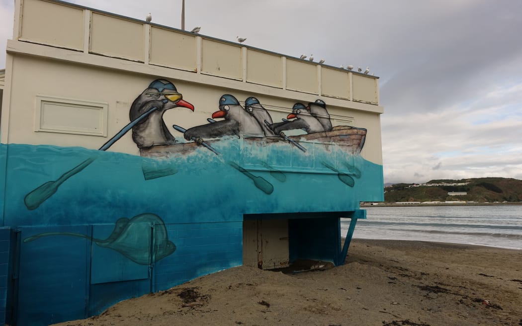 An example of street artist DSIDE's work on the Lyall Bay Surf and Life Saving Club before it is demolished.