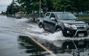 Napier flood - car driving in water