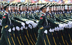 Chinese PLA (People’s Liberation Army) soldiers march past the Tian’anmen Rostrum during the military parade to commemorate the 70th anniversary of the victory in the Chinese People’s War of Resistance Against Japanese Aggression in Beijing, China, 3 September 2015.