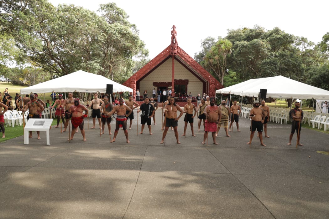 Tangata whenua welcome politicians to the Treaty Grounds at Waitangi.