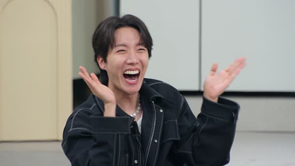 BTS member J-Hope smiles broadly clapping his hands on the JTBC show Chef & My Fridge.