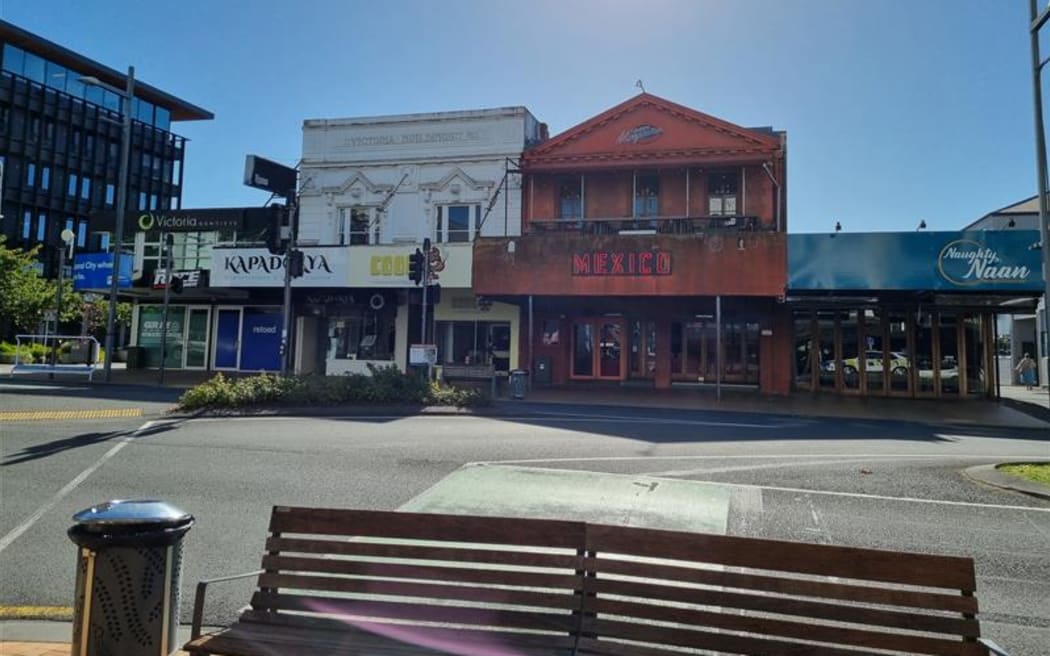 A block on Hamilton's Victoria Street which will be developed. The buildings on the left border the park Victoria On The River and will become public park space. The buildings on the right will be developed into a 25-story tower.