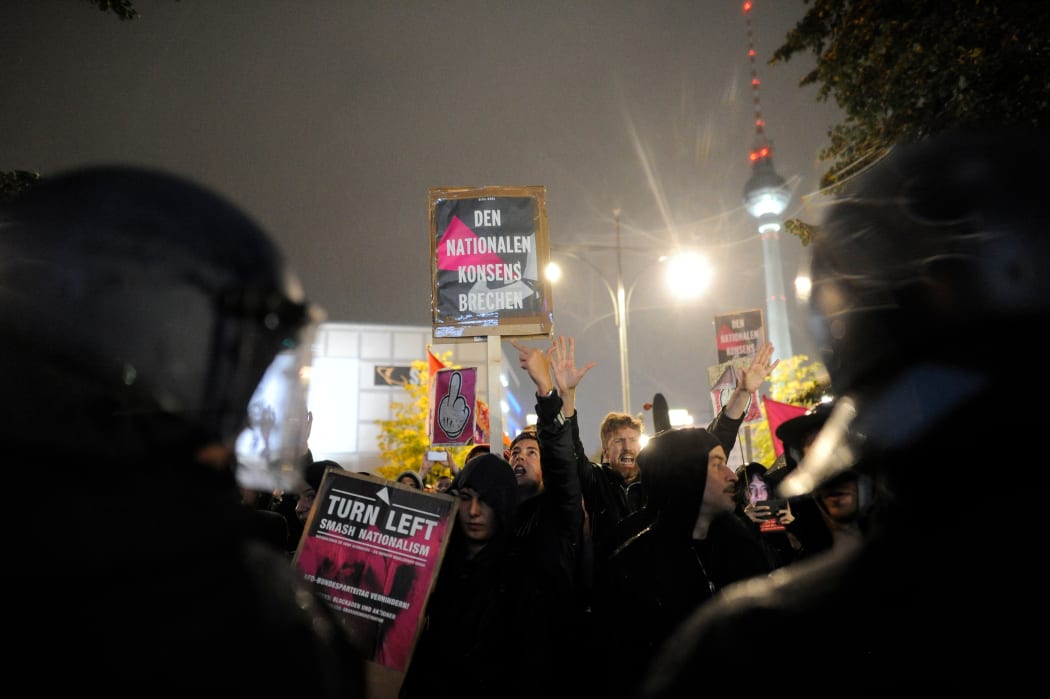 Hundreds of demonstrators gathered in Berlin carrying with anti-AfD placards.
