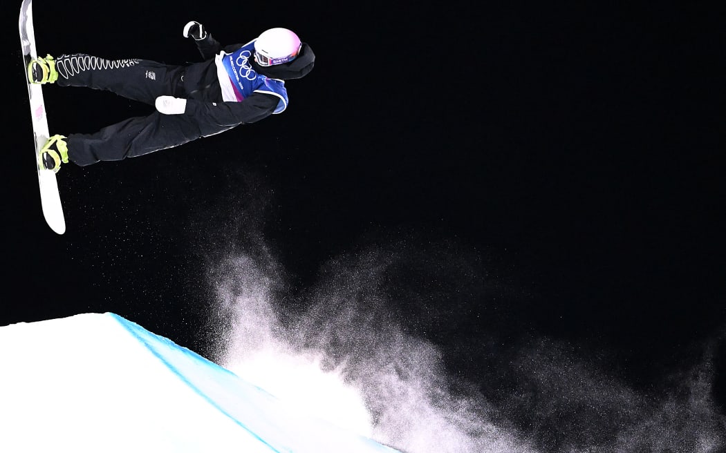 New Zealand's Lucia Georgalli competes in the snowboard women's big air qualification during the Milano Cortina Winter Olympics.