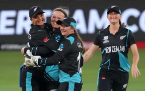 Lea Tahuhu of New Zealand celebrates a wicket with White Ferns team-mates during 2024 T20 cricket World Cup.