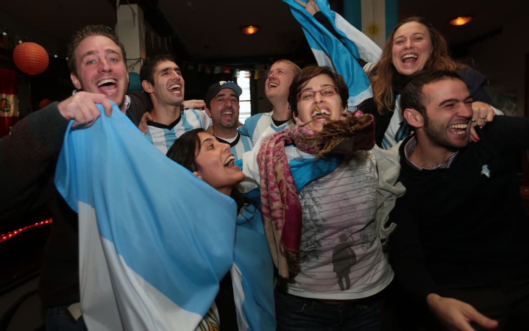 Argentinian fans in Wellington celebrate victory against the Netherlands in the semi finals of the 2014 Football World Cup.