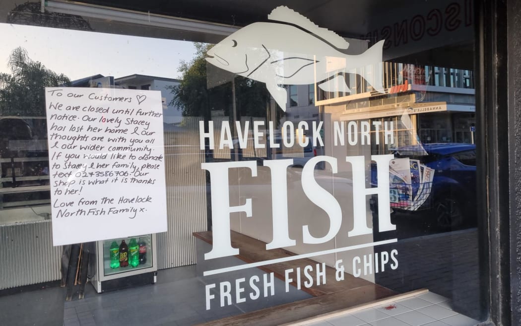 A sign in the window of a fish shop in Havelock North, as staff recover from Cyclone Gabriel.