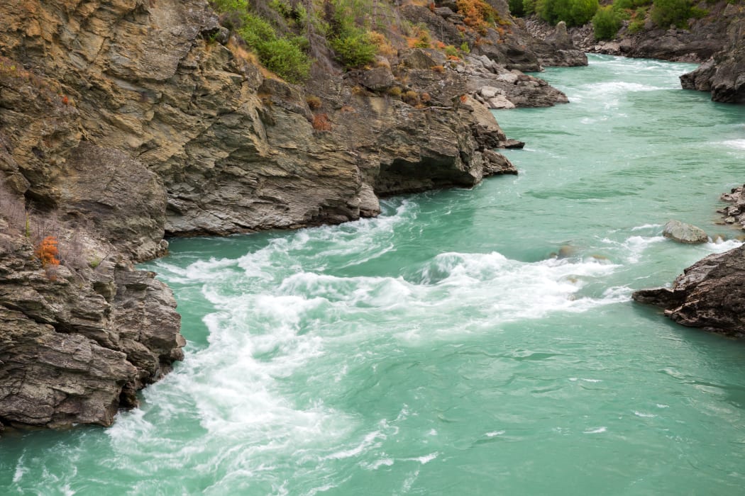 Two men got caught in rapids on the Kawarau River on an inflatable matress.