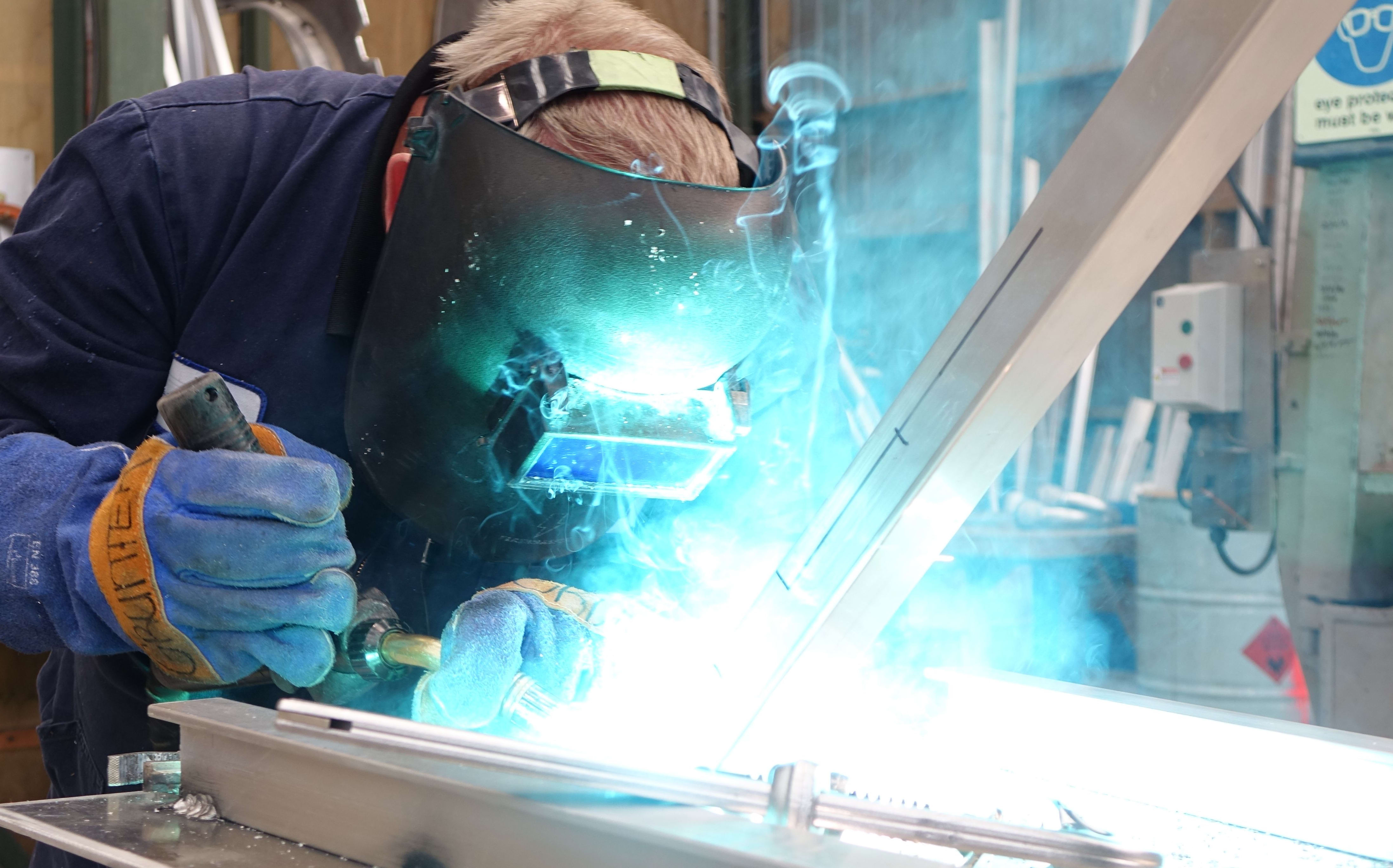 Q-West Boat Builders welding fabricator Grant Loveridge works on a new ferry for the Auckland market.