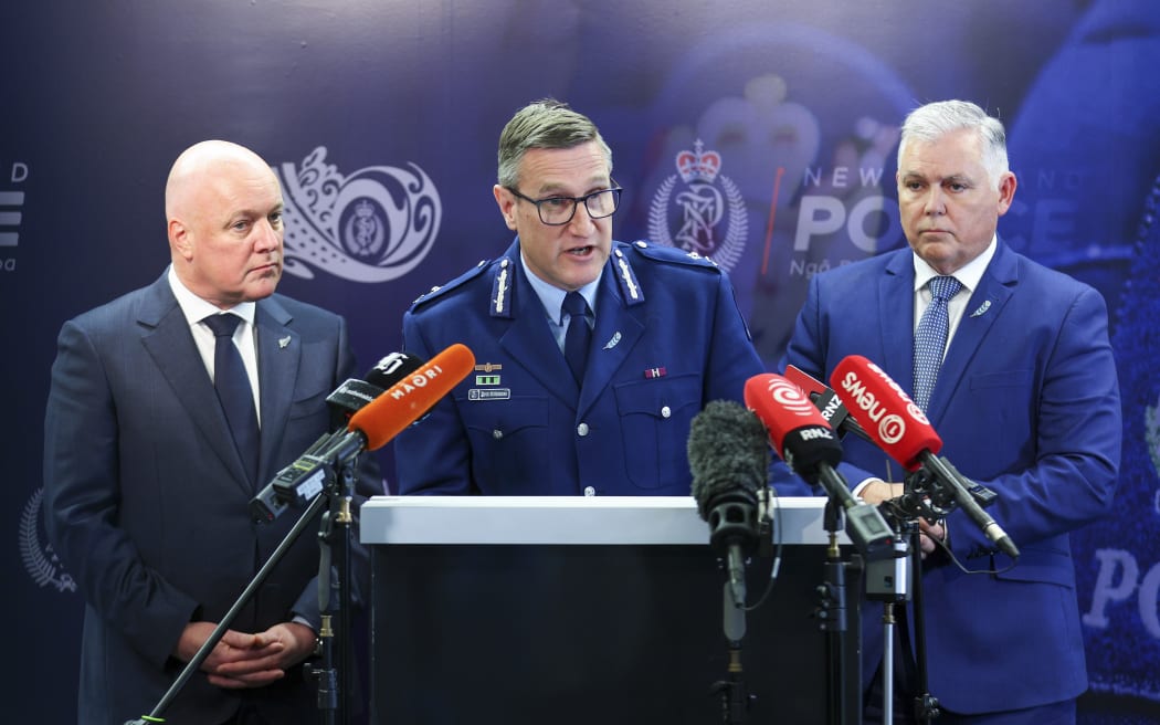 Former Deputy Commissioner Jevon McSkimming, with Prime Minister Christopher Luxon and Police Minister Mark Mitchell.