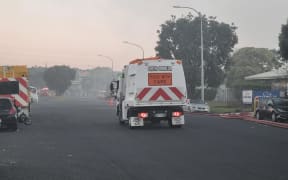 A Green Gorilla waste management vehicle outside the plant in Onehunga, Auckland, where are fire was burning for a second day, 8 February 2024.