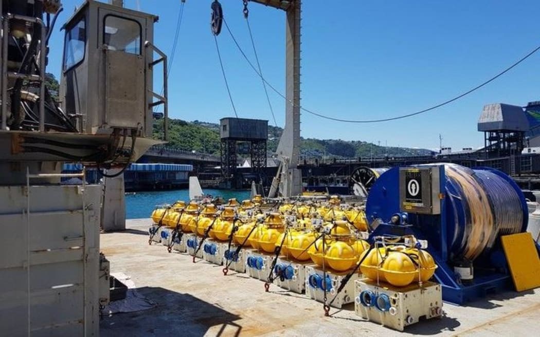 The floats being deployed on the sea floor to study New Zealand's subduction zone.