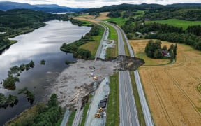 Picture taken on August 30, 20205 shows a motorway damaged by a landslide at Nesvatnet near Levanger, Norway. (Photo by Ole Martin Wold / NTB / AFP) / Norway OUT / NORWAY OUT / NORWAY OUT