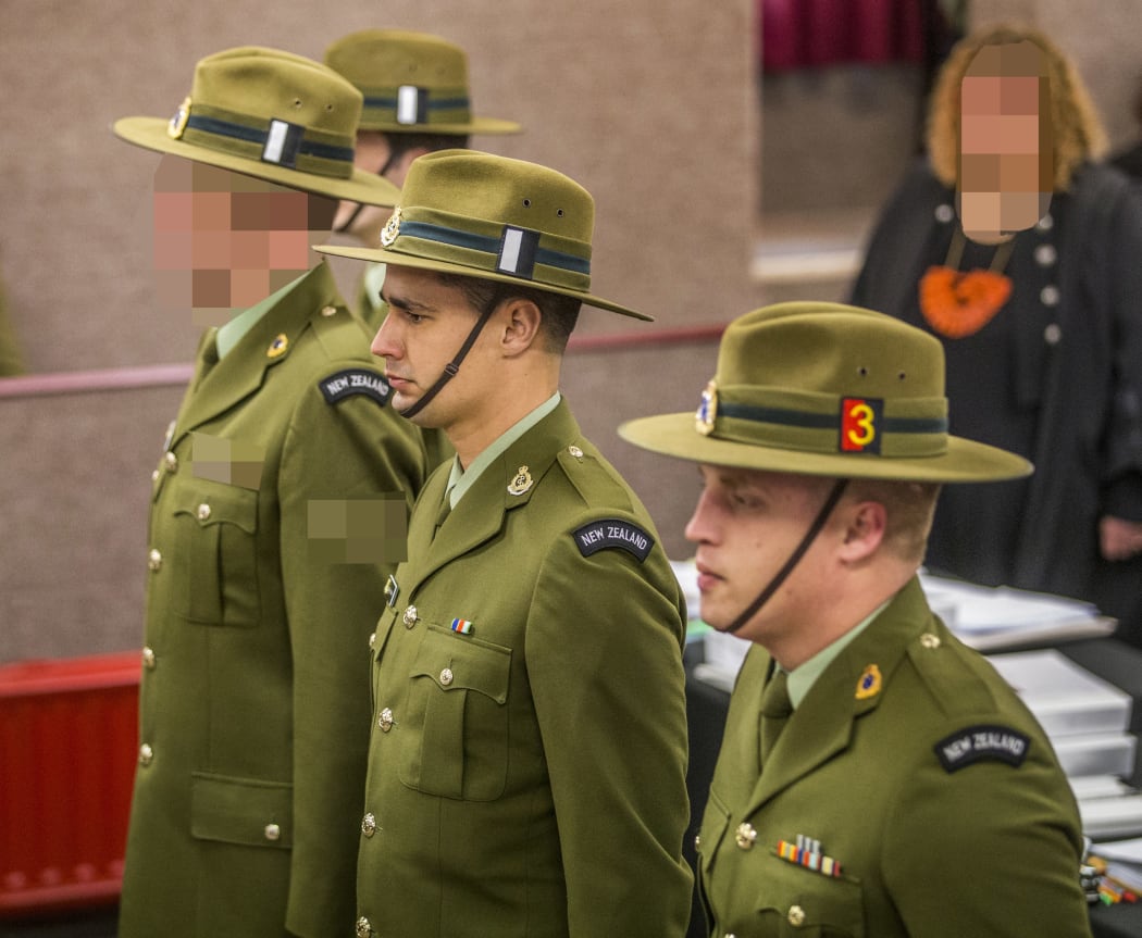 The unnamed soldier, Private Paul Dobson, and Private Donald Thomson