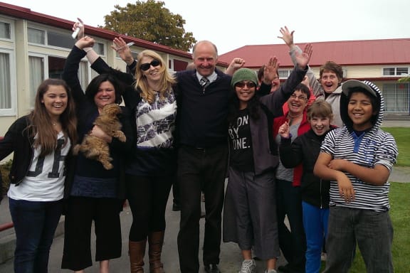 Staff and pupils at Phillipstown School celebrate.