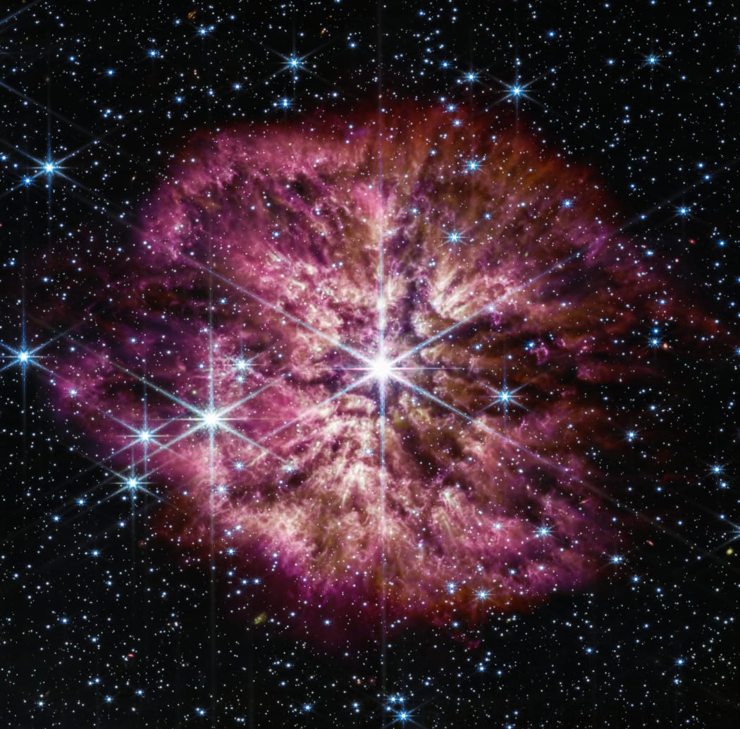 The outburst of purple gas and dust once made up the Wolf Rayet 124 star's outer layer.