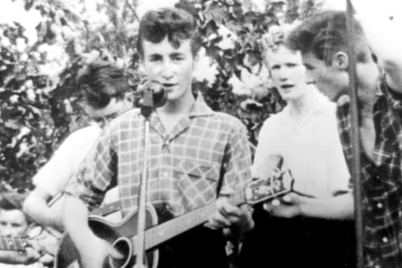 The Quarrymen 1957, John Lennon with guitar