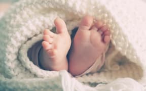 Photo of newborn baby feet